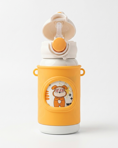 A child's water bottle with a bright yellow silicone sleeve featuring a cartoon tiger wearing sunglasses, a white plastic body, and a matching white and yellow flip-top lid with a clear straw.