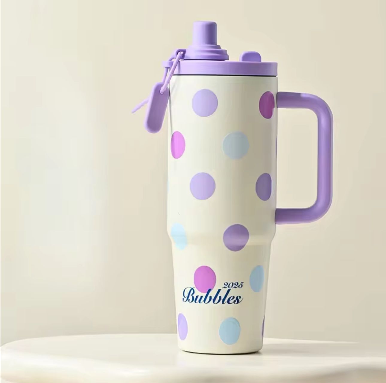 Purple double drink insulated tumbler with leakproof straw lid and ergonomic handle