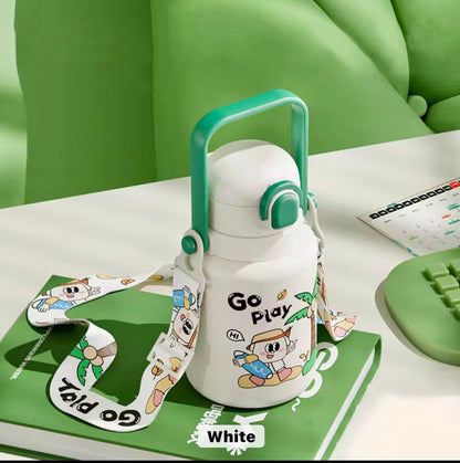 White water bottle with green handle and cartoon character design on a green surface
