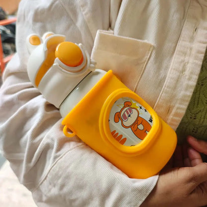 Yellow and white water bottle with cartoon character on a beige jacket