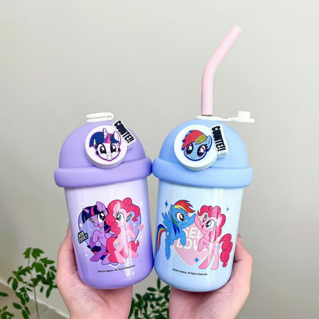 Two colorful children's cups with cartoon characters on a neutral background