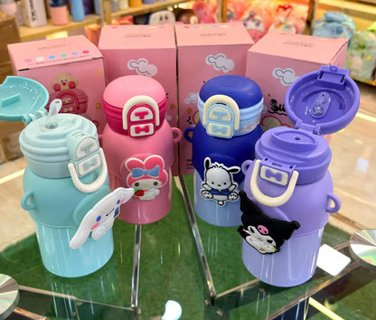 Colorful children's water bottles with cartoon character designs on a display stand.