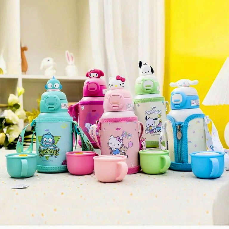 Colorful children's thermos bottles and cups with cartoon designs on a light surface.