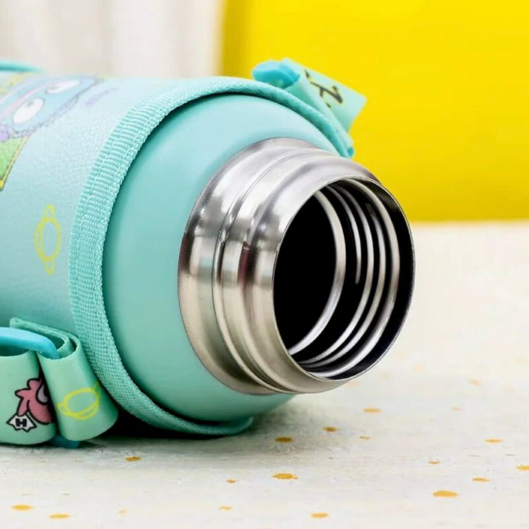 Teal thermos with colorful design on a light surface